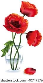 Silk red flowers (poppies) in a glass vase