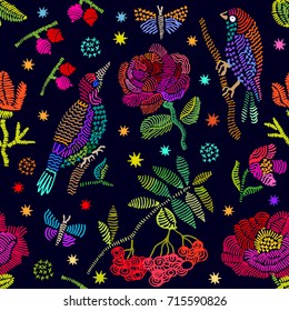 Silk scarf with rowan and embroidered birds. Seamless vector pattern with colorful flowers, butterflies and stars on black background. Folk art textile collection.