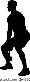Sillhouette of strong man lifting weights in gym workout session