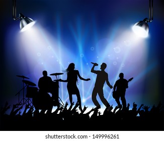 Silouette of dancing at a rock concert