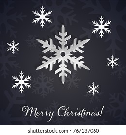 Silver 3D snowflakes on the dark winter and New Year background with snowflake silhouettes. Merry Christmas text on the elegant and minimal black background. Vector Illustration. 