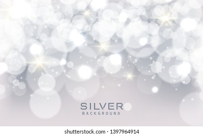 Silver abstract bokeh background sparkling lights effect. Blured circle on gray background.