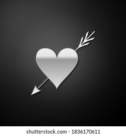 Silver Amour symbol with heart and arrow icon isolated on black background. Love sign. Valentines symbol. Long shadow style. Vector.