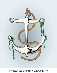 Silver anchor with rope and seaweed