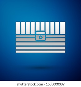 Silver Antique treasure chest icon isolated on blue background. Vintage wooden chest with golden coin.  Vector Illustration