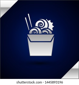 Silver Asian noodles in paper box and chopsticks icon isolated on dark blue background. Street fast food menu. Korean, Japanese, Chinese food.  Vector Illustration