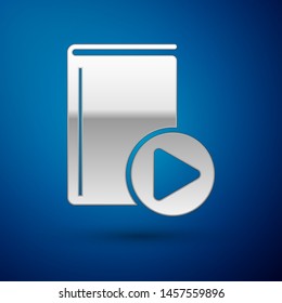 Silver Audio book icon isolated on blue background. Play button and book. Audio guide sign. Online learning concept.  Vector Illustration