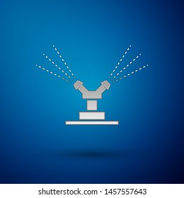 Silver Automatic irrigation sprinklers icon isolated on blue background. Watering equipment. Garden element. Spray gun icon.  Vector Illustration