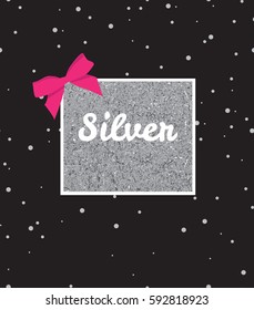 Silver background with sequins and pink bow on black background