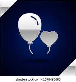 Silver Balloons in form of heart with ribbon icon isolated on dark blue background.  Vector Illustration