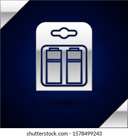 Silver Battery in pack icon isolated on dark blue background. Lightning bolt symbol.  Vector Illustration