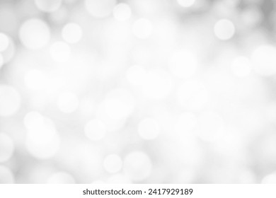 Silver Bokeh Background. Festive Winter Pattern. Blurred Design. Vector illustration