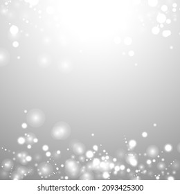 Silver Bokeh Christmas Background. Snow Flakes on Light Grey. Blurred Vector Design. Holiday Winter Backdrop With Glow and Overlay Effect. Season Bling Christmas Decoration.