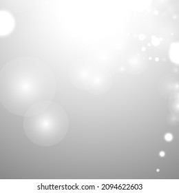 Silver Bokeh Christmas Background. Snow Flakes on Light Grey. Blurred Vector Design. Holiday Winter Backdrop With Glow and Overlay Effect. Season Bling Christmas Decoration.