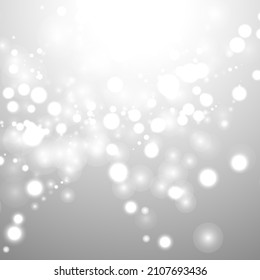Silver Bokeh Christmas Background. Snow Flakes on Light Grey. Blurred Vector Design. Holiday Winter Backdrop With Glow and Overlay Effect. Season Bling Christmas Decoration.