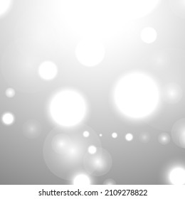 Silver Bokeh Christmas Background. Snow Flakes on Light Grey. Blurred Vector Design. Holiday Winter Backdrop With Glow and Overlay Effect. Season Bling Christmas Decoration.