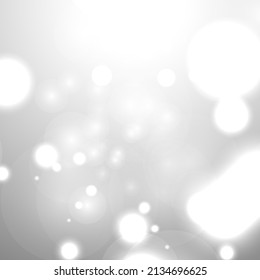 Silver Bokeh Christmas Background. Snow Flakes on Light Grey. Blurred Vector Design. Holiday Winter Backdrop With Glow and Overlay Effect. Season Bling Christmas Decoration.