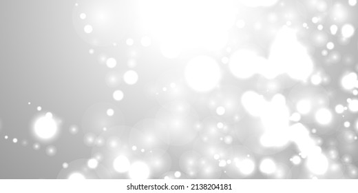 Silver Bokeh Christmas Background. Snow Flakes on Light Grey. Blurred Vector Design. Holiday Winter Backdrop With Glow and Overlay Effect. Season Bling Christmas Decoration.