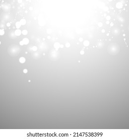 Silver Bokeh Christmas Background. Snow Flakes on Light Grey. Blurred Vector Design. Holiday Winter Backdrop With Glow and Overlay Effect. Season Bling Christmas Decoration.