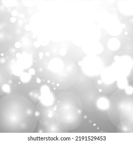 Silver Bokeh Christmas Background. Snow Flakes on Light Grey. Blurred Vector Design. Holiday Winter Backdrop With Glow and Overlay Effect. Season Bling Christmas Decoration.