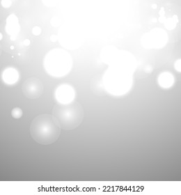 Silver Bokeh Christmas Background. Snow Flakes on Light Grey. Blurred Vector Design. Holiday Winter Backdrop With Glow and Overlay Effect. Season Bling Christmas Decoration.