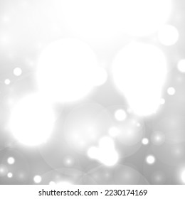 Silver Bokeh Christmas Background. Snow Flakes on Light Grey. Blurred Vector Design. Holiday Winter Backdrop With Glow and Overlay Effect. Season Bling Christmas Decoration.