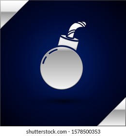 Silver Bomb ready to explode icon isolated on dark blue background. Vector Illustration