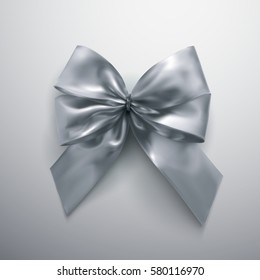 Silver Bow And Ribbons. Vector Holiday Illustration. Realistic Decoration Element For Design