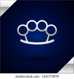 Silver Brass knuckles icon isolated on dark blue background.  Vector Illustration