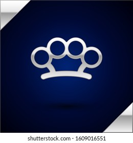 Silver Brass knuckles icon isolated on dark blue background.  Vector Illustration