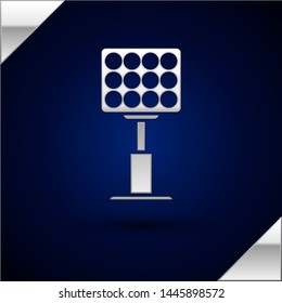 Silver Bright stadium lights icon isolated on dark blue background. Spotlight on a football field. Floodlight, light projector.  Vector Illustration