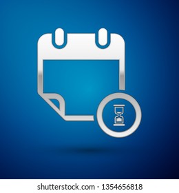 Silver Calendar and clock icon isolated on blue background. Schedule, appointment, organizer, timesheet, time management, important date. Vector Illustration