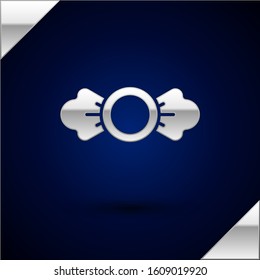 Silver Candy icon isolated on dark blue background.  Vector Illustration