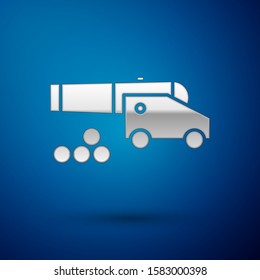 Silver Cannon with cannonballs icon isolated on blue background. Medieval weapons.  Vector Illustration