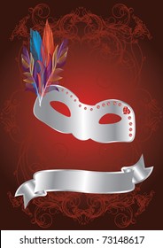 silver carnival mask on red background