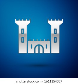 Silver Castle icon isolated on blue background. Fortress sign.  Vector Illustration