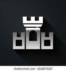 Silver Castle icon isolated on black background. Medieval fortress with a tower. Protection from enemies. Reliability and defense of the city. Long shadow style. Vector