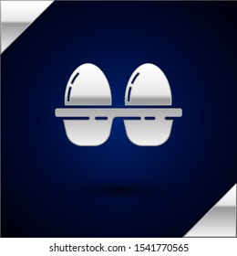 Silver Chicken egg in box icon isolated on dark blue background.  Vector Illustration