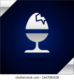 Silver Chicken egg on a stand icon isolated on dark blue background. Happy Easter.  Vector Illustration