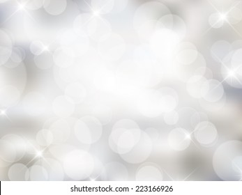 Silver Christmas background with bokeh lights and stars