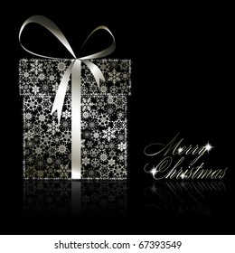 Silver Christmas gift box made of snowflakes and stars on black background. Vector eps10 illustration