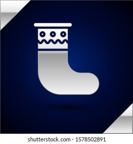 Silver Christmas stocking icon isolated on dark blue background. Merry Christmas and Happy New Year.  Vector Illustration
