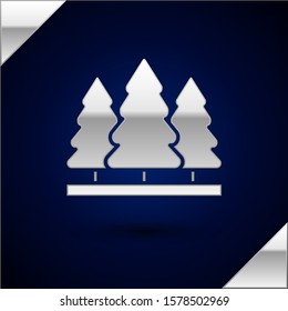 Silver Christmas trees icon isolated on dark blue background. Merry Christmas and Happy New Year.  Vector Illustration