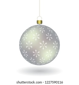 Silver Christmass ball with snowflakes print hanging on a golden chain