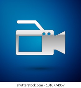 Silver Cinema camera icon isolated on blue background. Video camera. Movie sign. Film projector. Vector Illustration