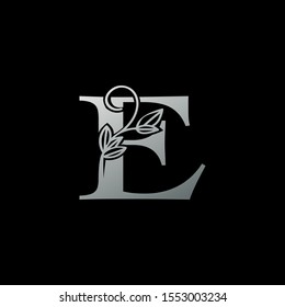 Silver classy Initial letter E  vintage Logo Icon. Monocrome vintage Logo Icon recomended for boutique,restaurant, wedding service, hotel or business identity.