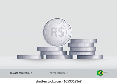 Silver coins. Realistic Brazilian Real coin standing on stacked coins. Finance concept for websites, web design, mobile app, infographics.