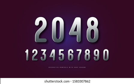 Silver colored and metal chrome sans serif numerals with rounded corners