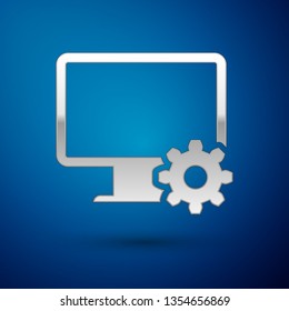Silver Computer monitor and gear icon isolated on blue background. Adjusting app, setting options, maintenance, repair, fixing monitor concepts. Vector Illustration