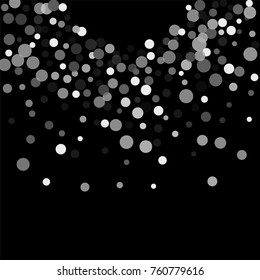 Silver confetti on a black background. Luxury festive background. Silver translucent abstract dots are scattered on a black background. Element of design. Vector illustration, EPS 10.